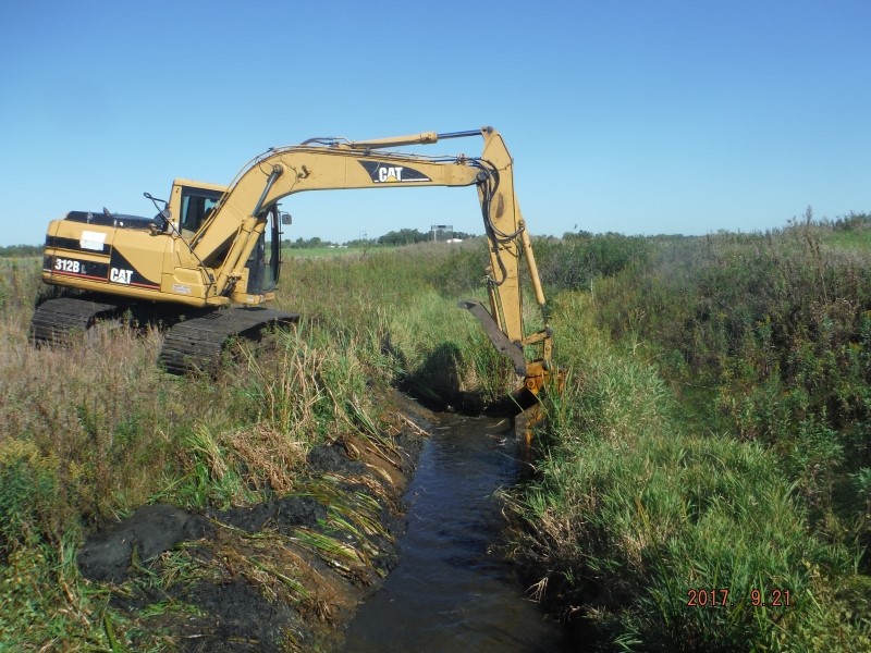 Ditch repair -Excavation of vegetation